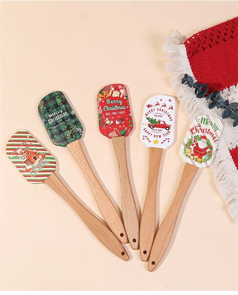 Espátula de silicone com cabo de madeira natalino.