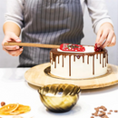 Espátula de silicone com cabo de madeira natalino.